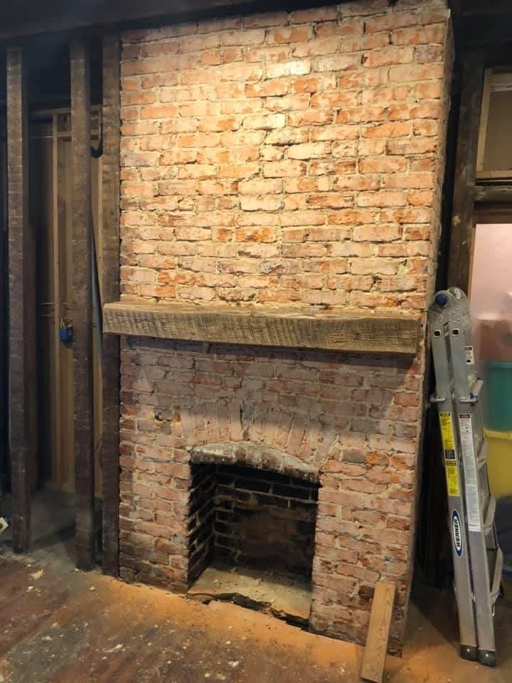 Built-in fireplace surround with custom cabinetry