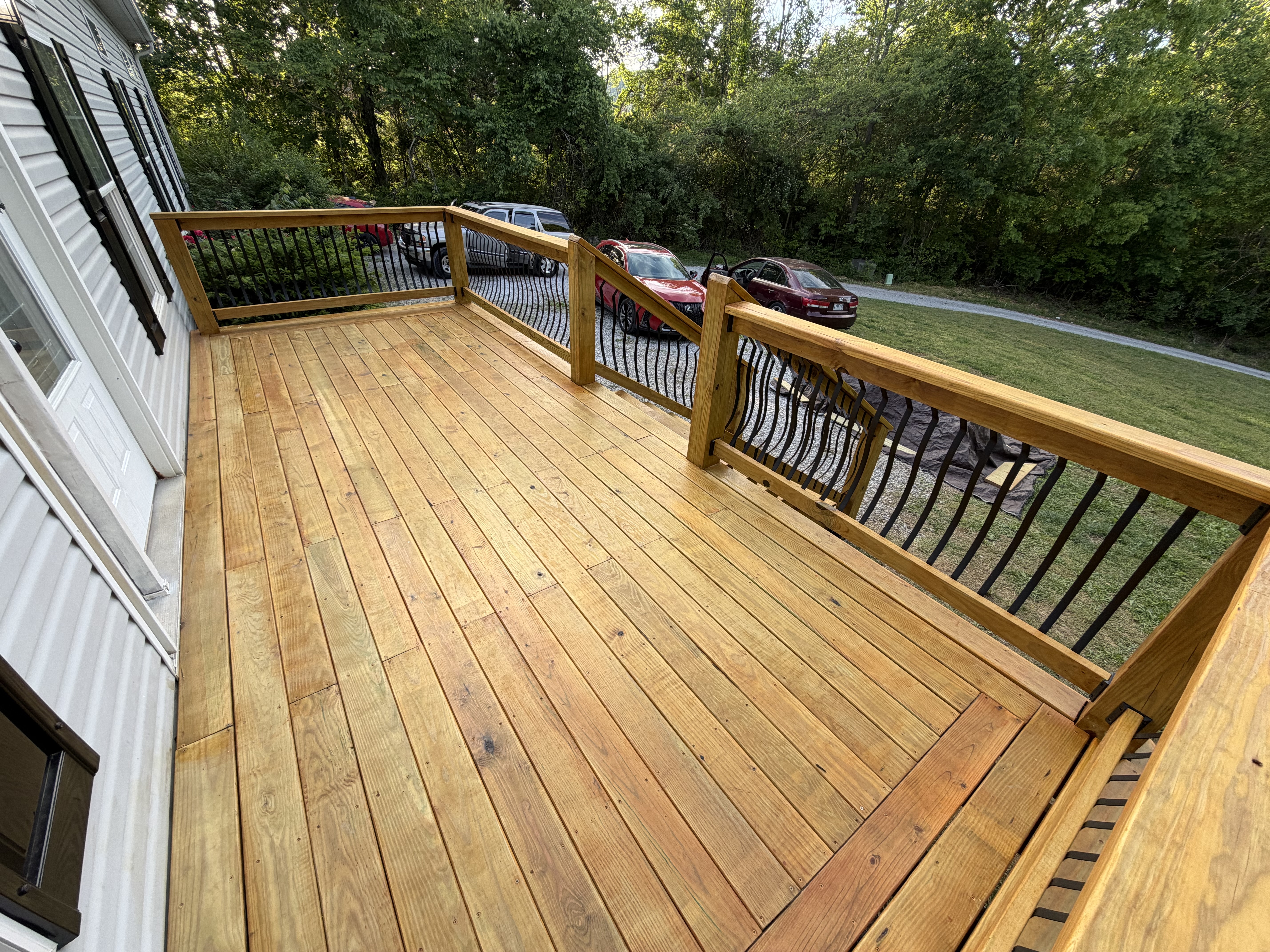 Fresh pressure-treated deck construction